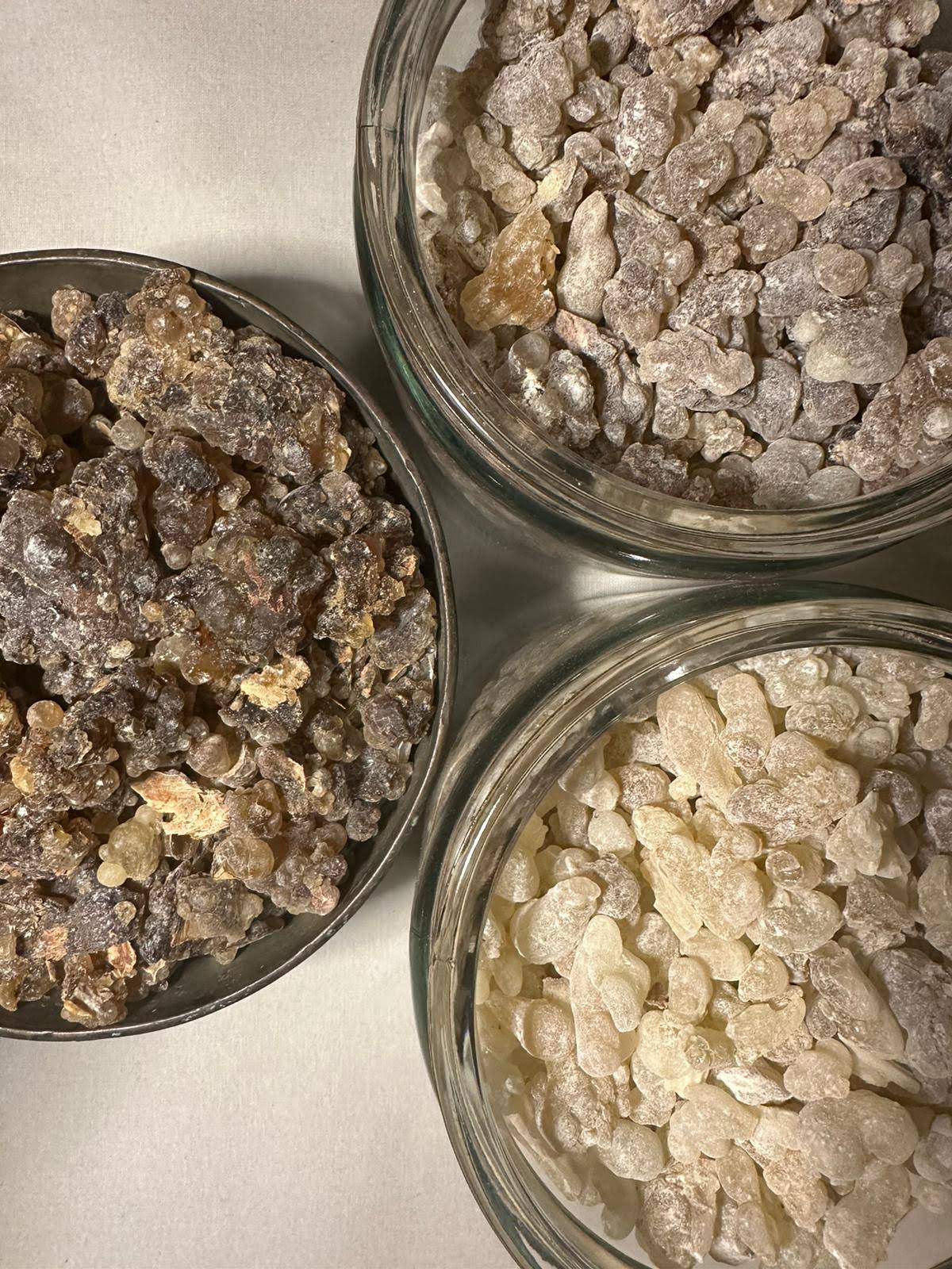Loose Hojari frankincense resin grades shown side by side, bird's-eye view
